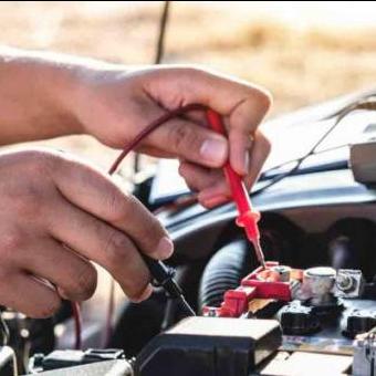 Car battery being tested